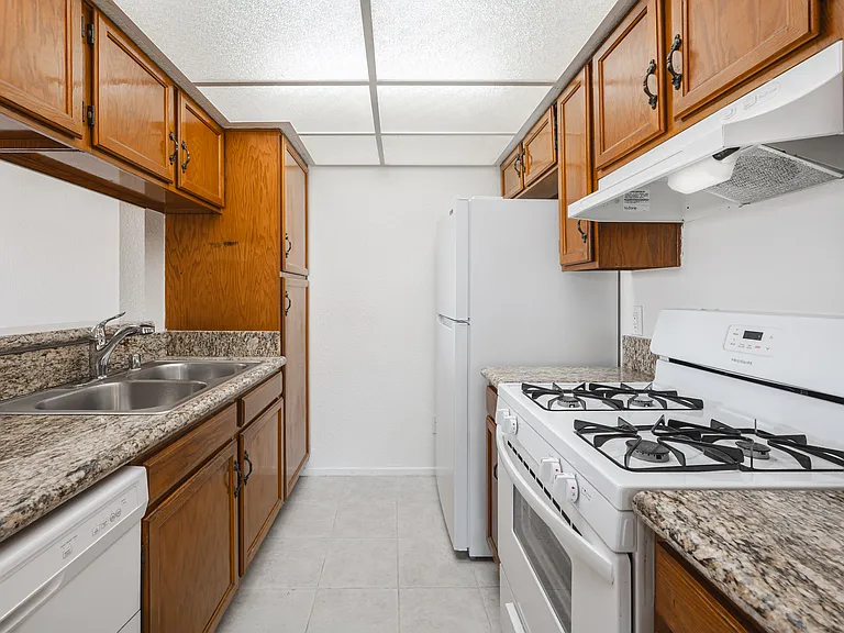 Kitchen with Dishwasher, Oven/Stove & Refrigerator Appliances