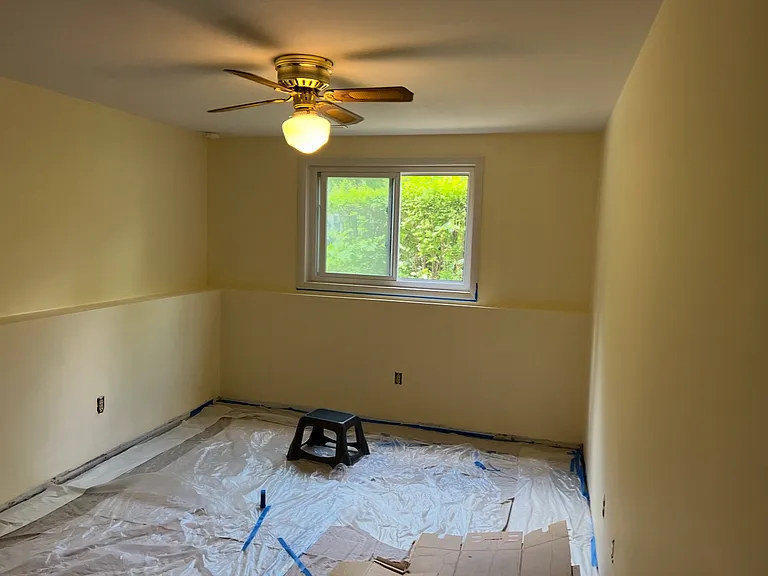 Downstairs (larger) bedroom, fits a queen bed & 2 night stands