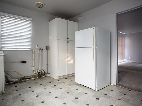 Included refrigerator and updated pantry. Connections for laundry in kitchen.