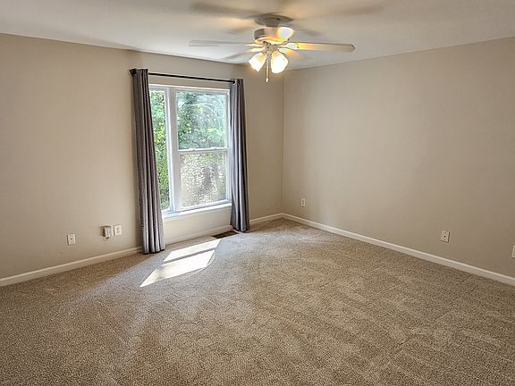 Master bedroom new carpet and paint.