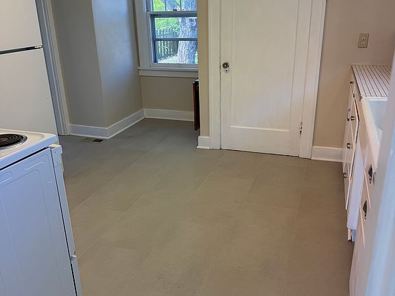 Kitchen View #2
New tile floor.