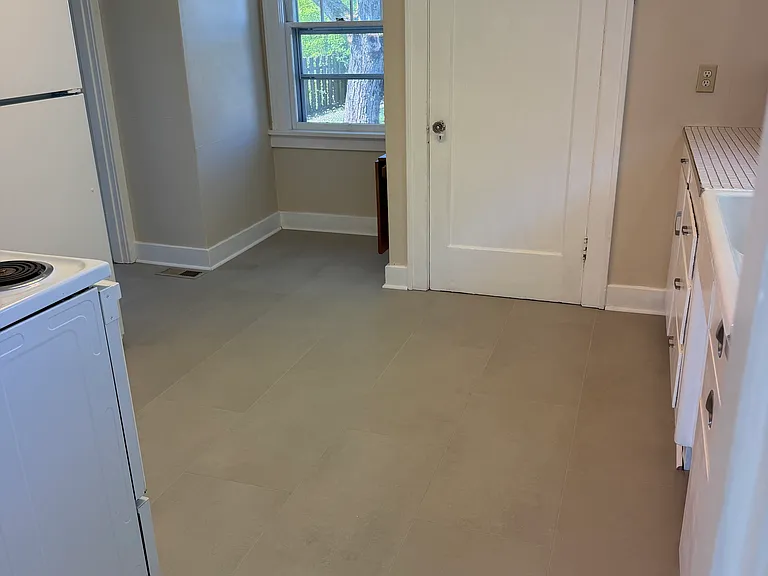Kitchen View #2
New tile floor.