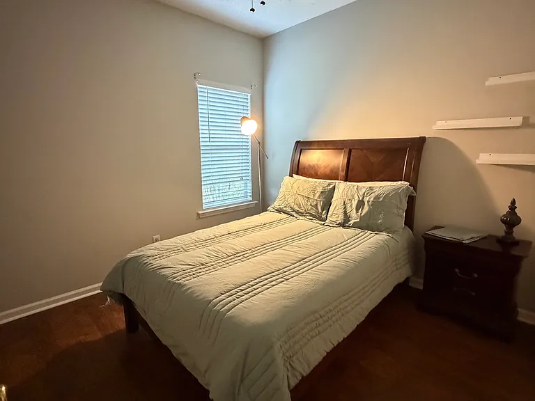This room features a full-size bed with newly fresh linens.