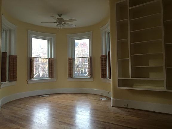 Sun-lit turret room w/windows & built-ins