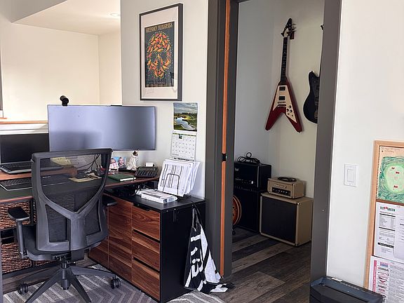 Very small room off of the living room with a pocket door.
