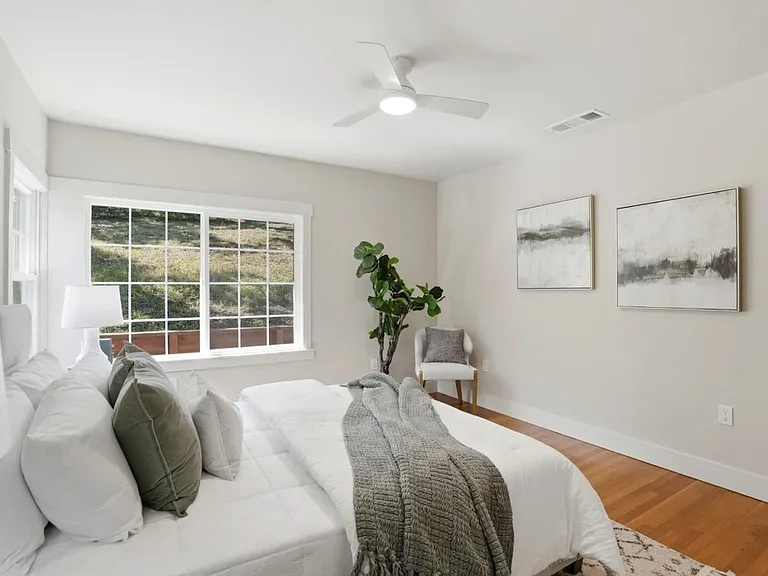 Bright and airy bedroom #2 with windows