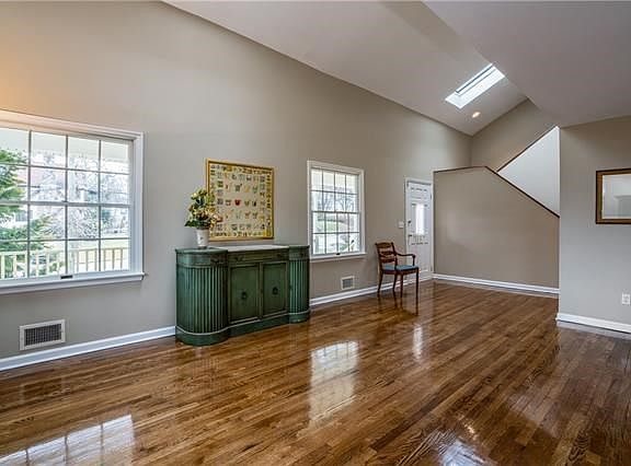 Living room and home entrance foyer