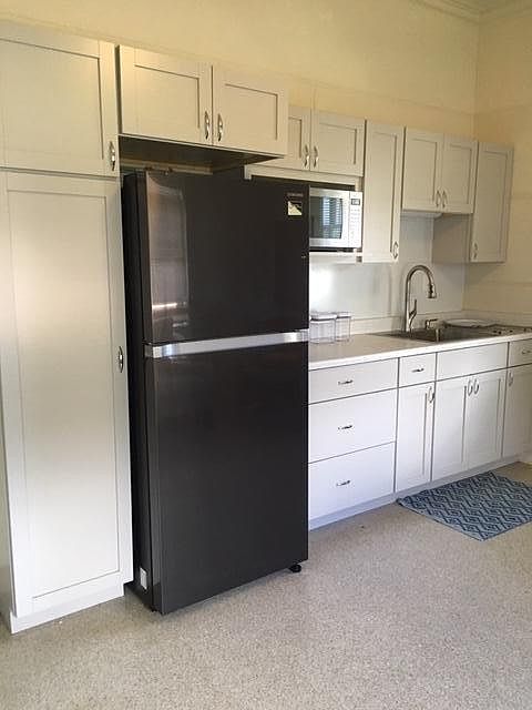 New kitchenette. Stocked with nice kitchenware. Microwave included. No stove.