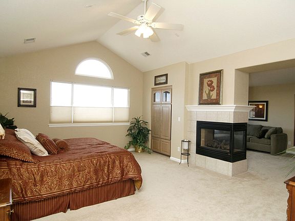 Spacious master retreat, 3 sided fireplace, built-in media cabinet