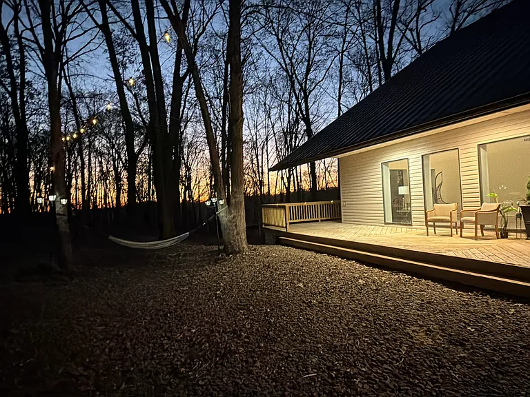 Private Wooded Acre with Hammock, Flag Pole & Fire Pit Area Sling yourself into the hammock between two old-growth oaks, watch the American flag wave over the canopy, and breathe in the kind of air you can't find in the city. Unhurried outdoor living!