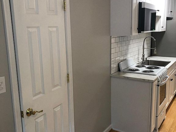 View of Living Room Coat Closet into Kitchen
