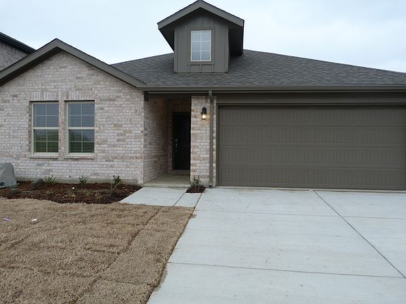 Front Elevation: Welcome to this stunning 2025-built home in the sought-after Stark Farms community!