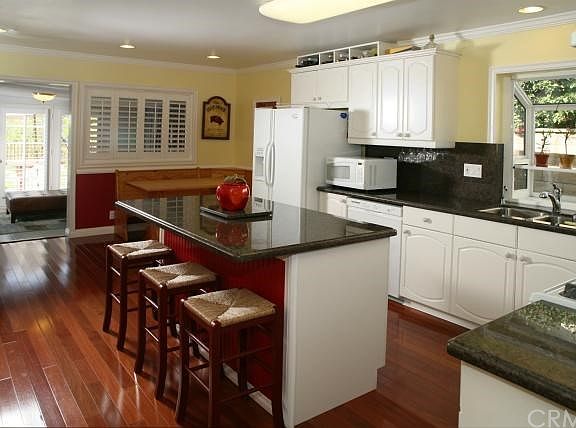Granite Kitchen counters with garden window