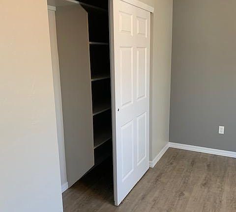 Nice size bedroom closet with built in dresser/storage