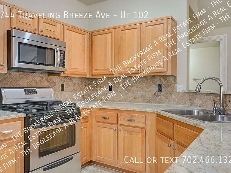 8744 Traveling Breeze Ave #102 — Photo 15