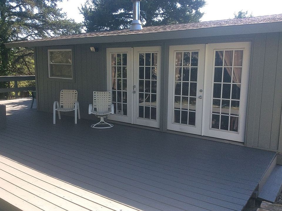 solid knotty pine interior.
wood burning stove
750 sq. ft. deck
baseboard heat.
city water and sewage
new paint and stain.

