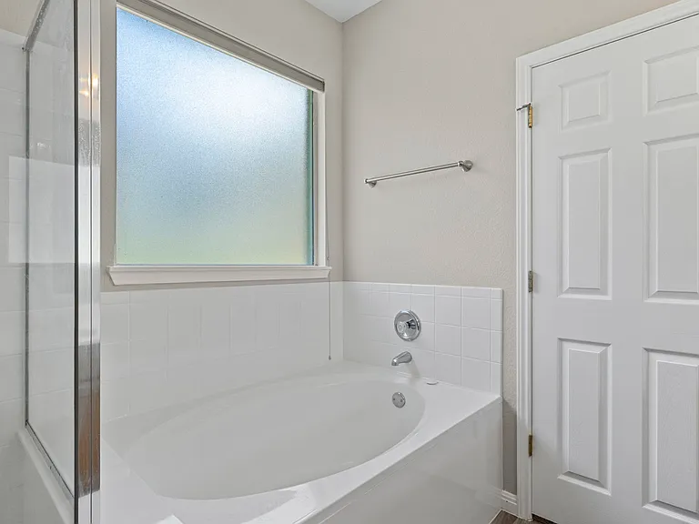 Primary Bathroom with separate tub/shower combo