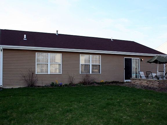 Two sliding doors lead to patio