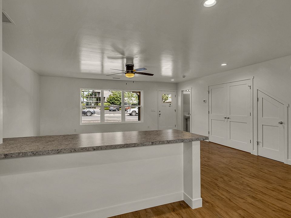 view from kitchen to living room and front door