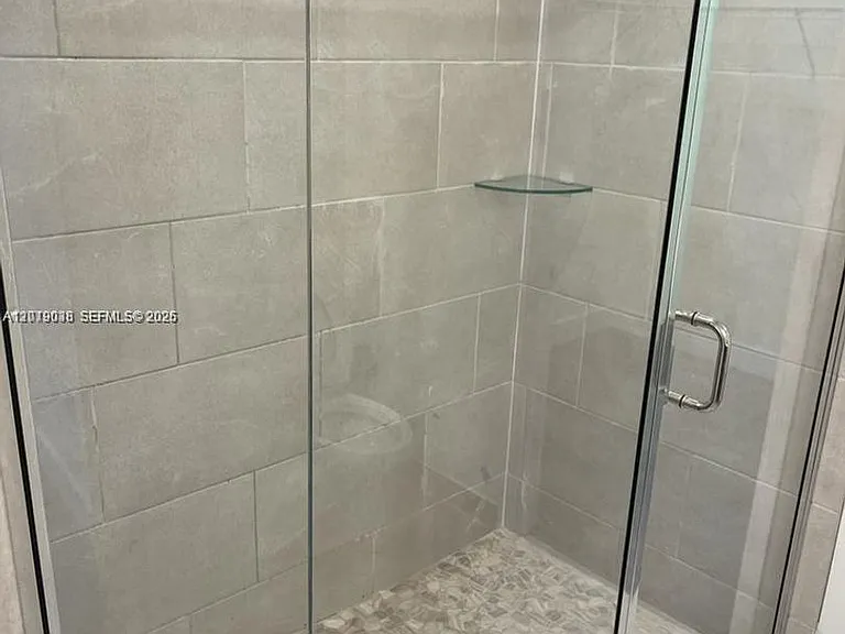 6450 NW 102nd Path #107 — Photo 11