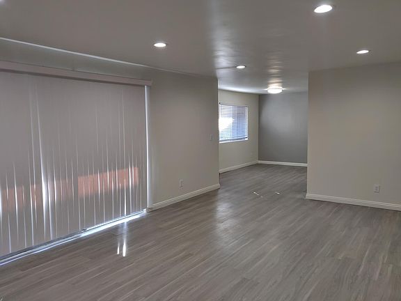 Recessed lighting, plank flooring