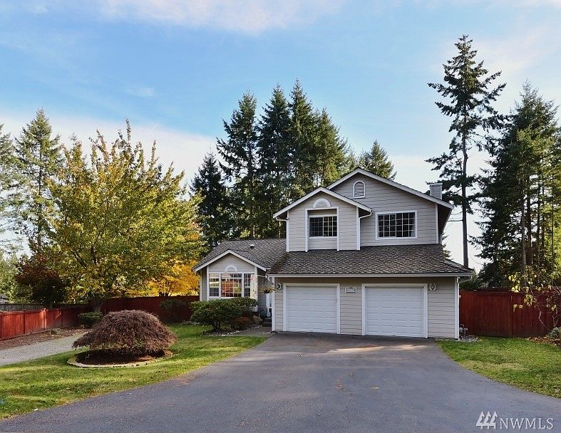 Two car garage and additional driveway for Rv or Toy parking.