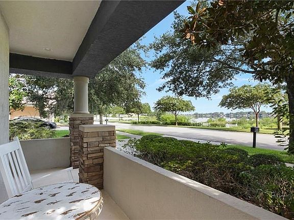 Truly relaxing Florida Lifestyle enjoying morning coffee on the front patio overlooking Lake Sawyer!!!