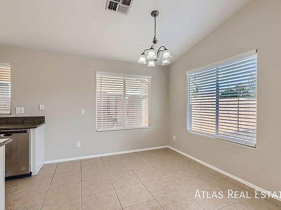 4th image of 6524 W Hilton Ave