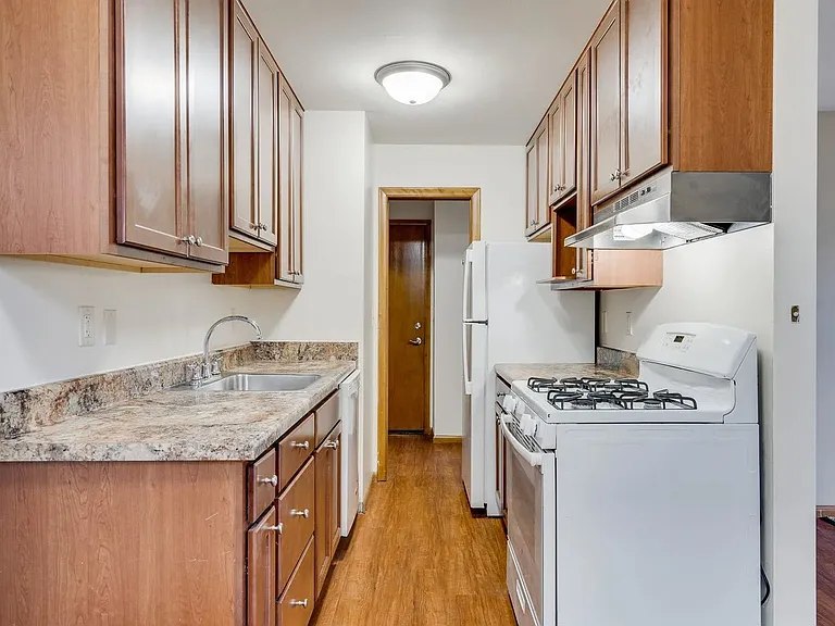 Elevate your lifestyle at Central Lakes of Uptown. This modern kitchen features sleek cabinetry and stunning countertops, perfect for culinary enthusiasts. Enjoy the community amenities and convenient location. Schedule your tour today!