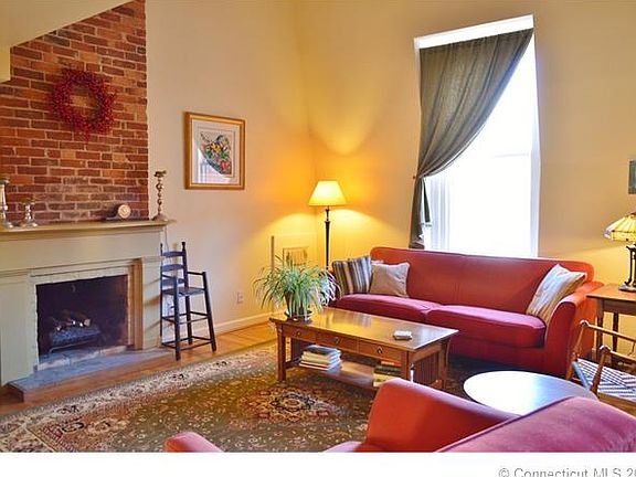 Living room area with firep...