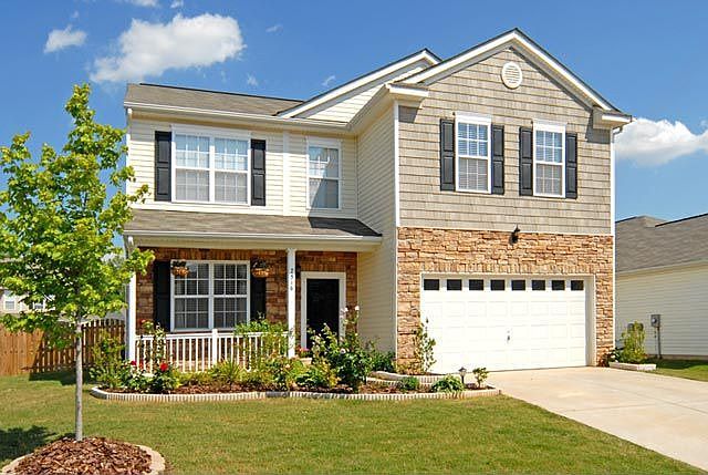 Picturesque Matthews home with inviting front porch