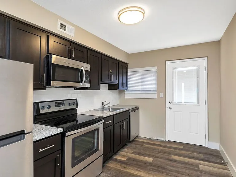 Nine-4-Nine Apts — Photo 2