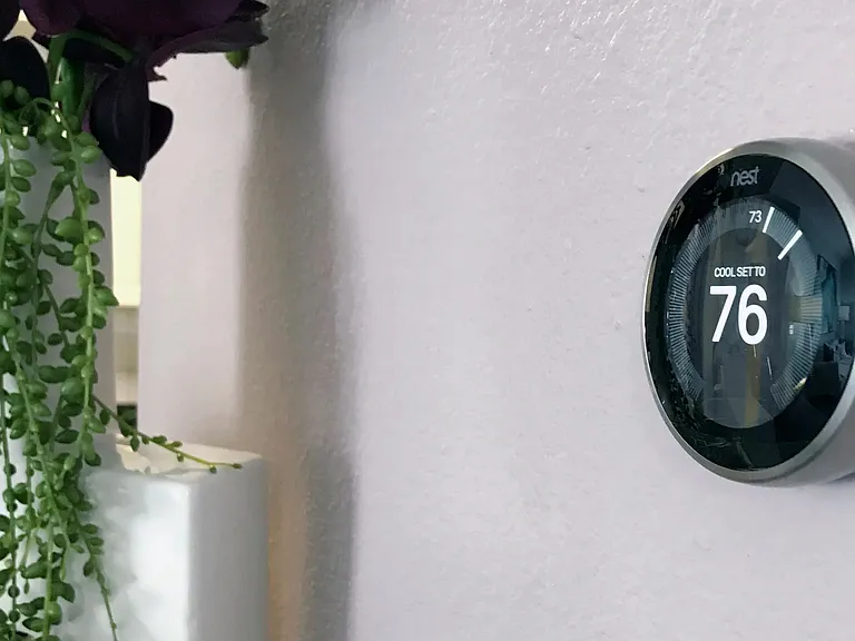 Smart thermostats included in each apartment home