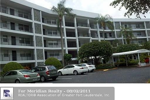 2nd image of 4020 W Palm Aire Dr APT 410
