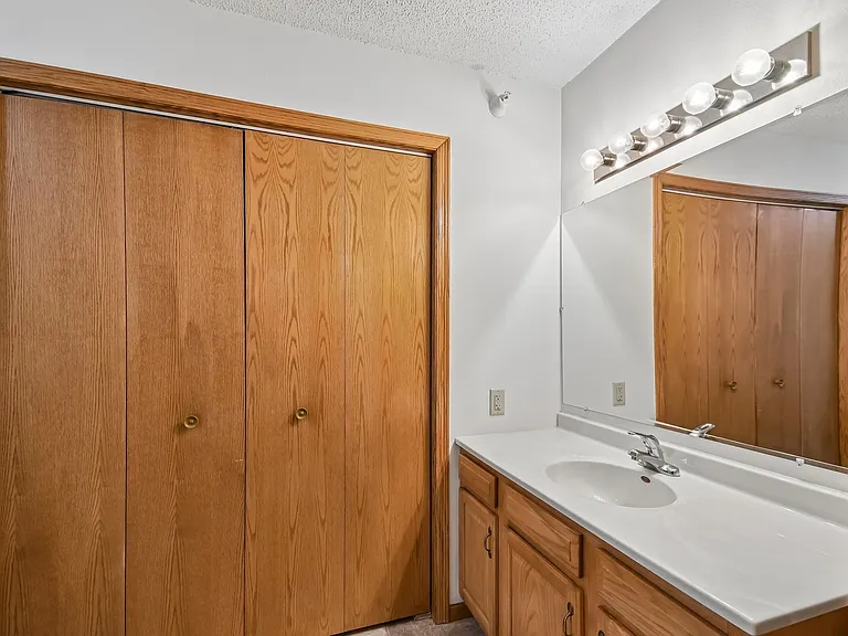 Elevate your living experience at Mill Pond Apartments with our stylish bathroom featuring modern finishes and ample storage. Enjoy a serene retreat right at home. Schedule your visit today to see it for yourself!