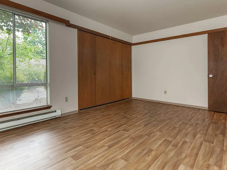 Spacious Bedroom with Ample Storage at Mariposa Apartments