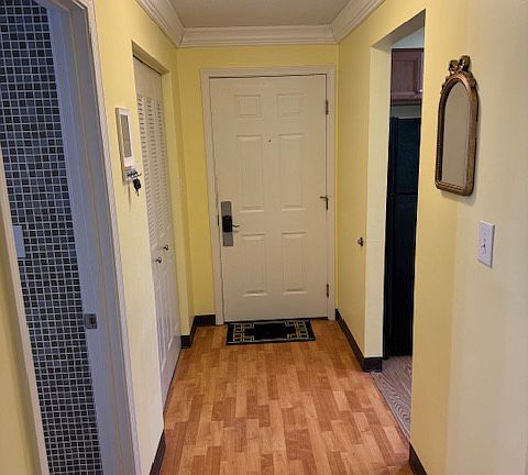 Entry hall with large coat closet
