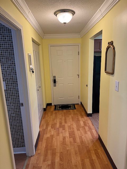 Entry hall with large coat closet
