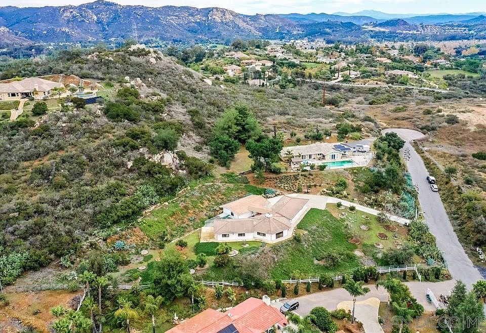 Tired of living in a typical track home neighborhood and wanting your own space to create your own private paradise? Over an acre lot with lots of space and privacy yet still close to the city