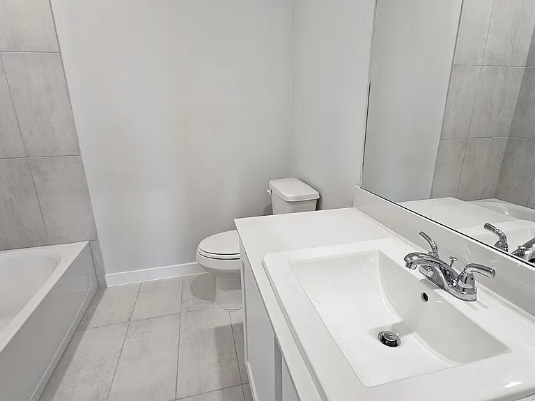 Modern bathroom featuring integrated linen storage_perfect for keeping towels and essentials organized
