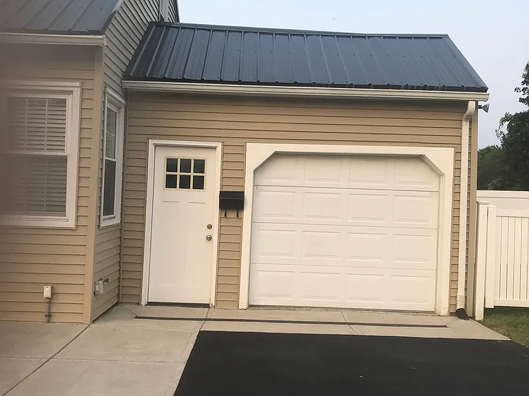 Exterior single stall garage