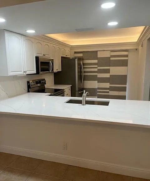 View of kitchen .
