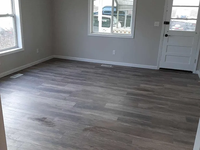 Living room with ceiling fan.