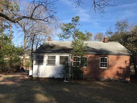 view from backyard of back of house