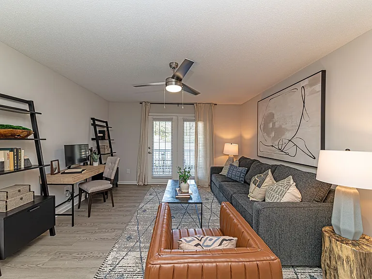 Spacious living room with hardwood-style flooring
