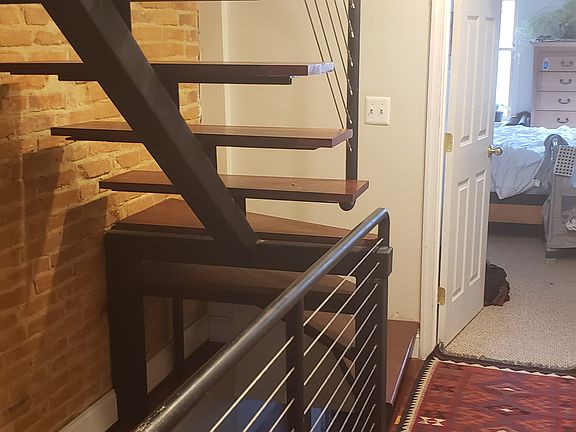 Second Floor hallway showing staircase to the third floor