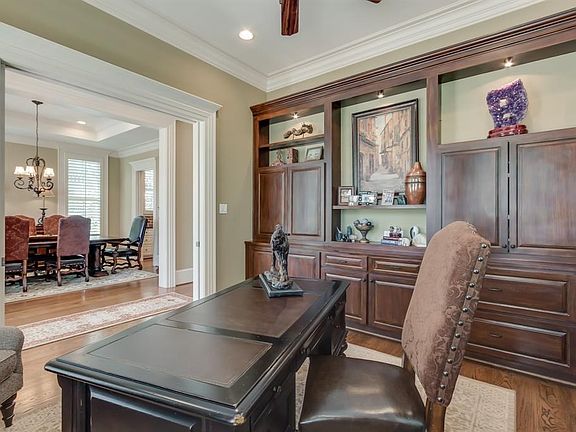 Work from home, this space makes it easy with an abundance of built ins and storage.