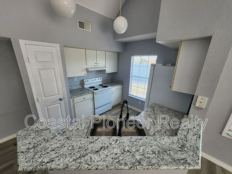 9232 Lake Chase Island Way — Photo 7