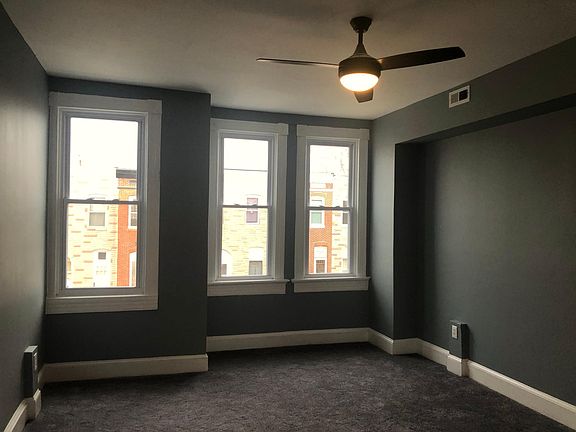 Upstairs main bedroom with calming blue color.