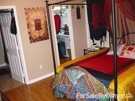 Master suite : Attached bath and fantastic walk-in closet with built-in shelves and top storage